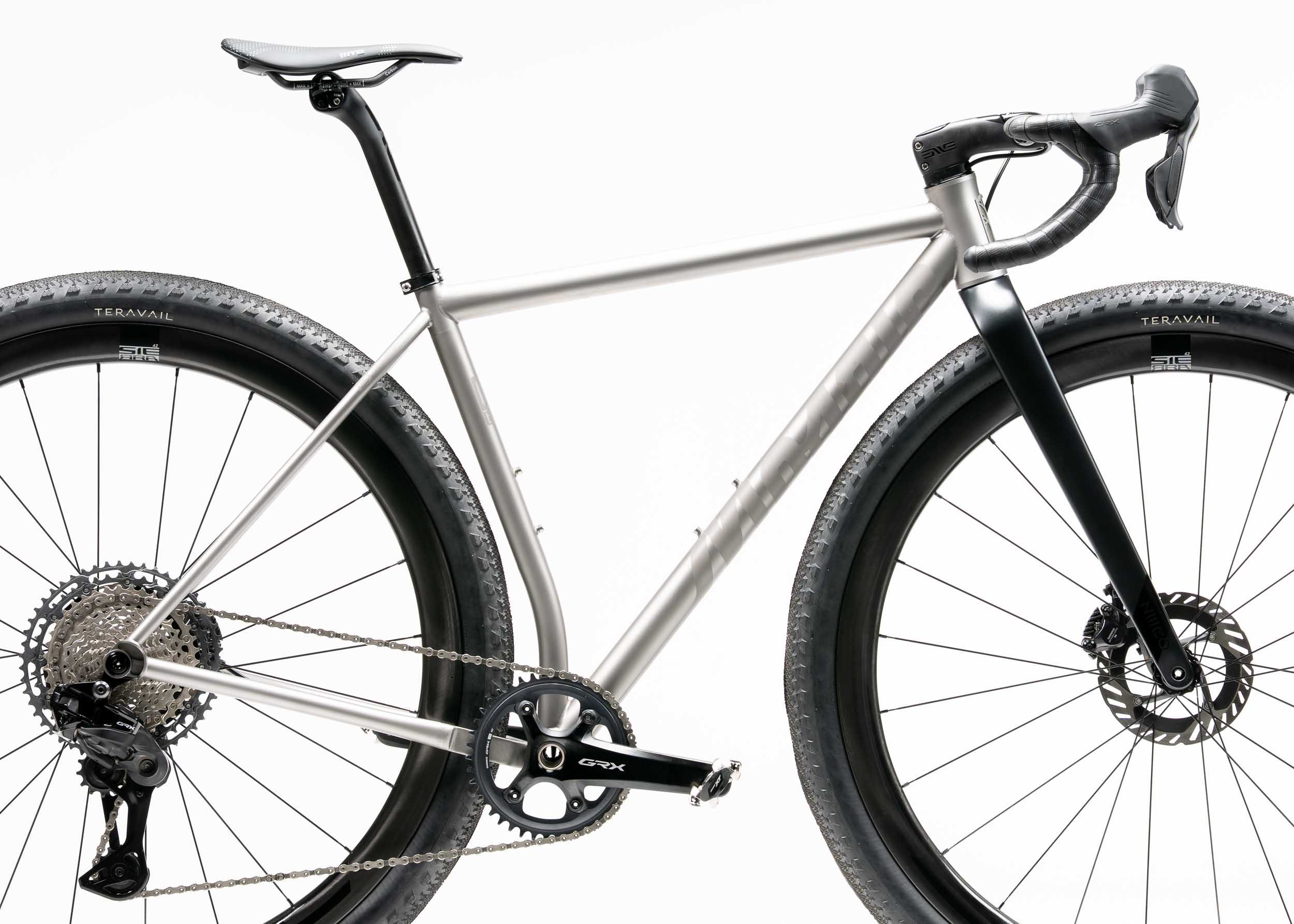 https://mosaiccycles.com/wp-content/uploads/2026/08/Mosaic-GT-2-i55-32-Titanium-Gravel-Bike-03.jpg