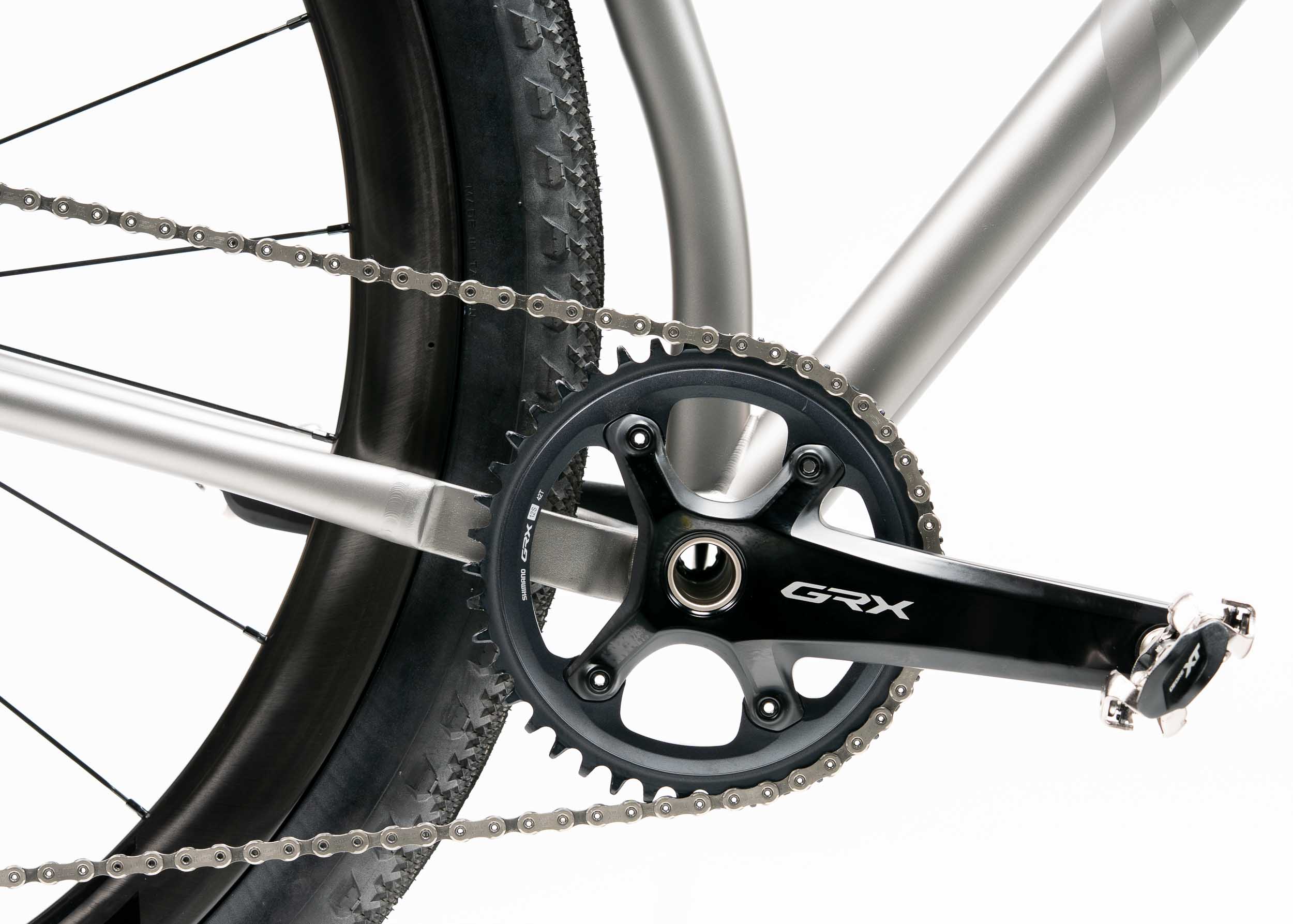 https://mosaiccycles.com/wp-content/uploads/2026/08/Mosaic-GT-2-i55-32-Titanium-Gravel-Bike-1.jpg
